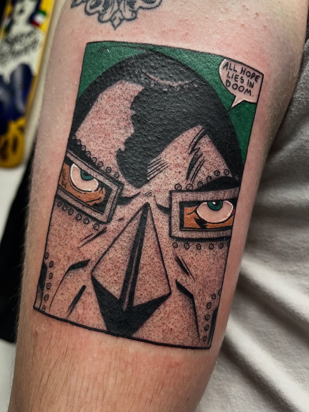 Doctor Doom comic book panel style color tattoo