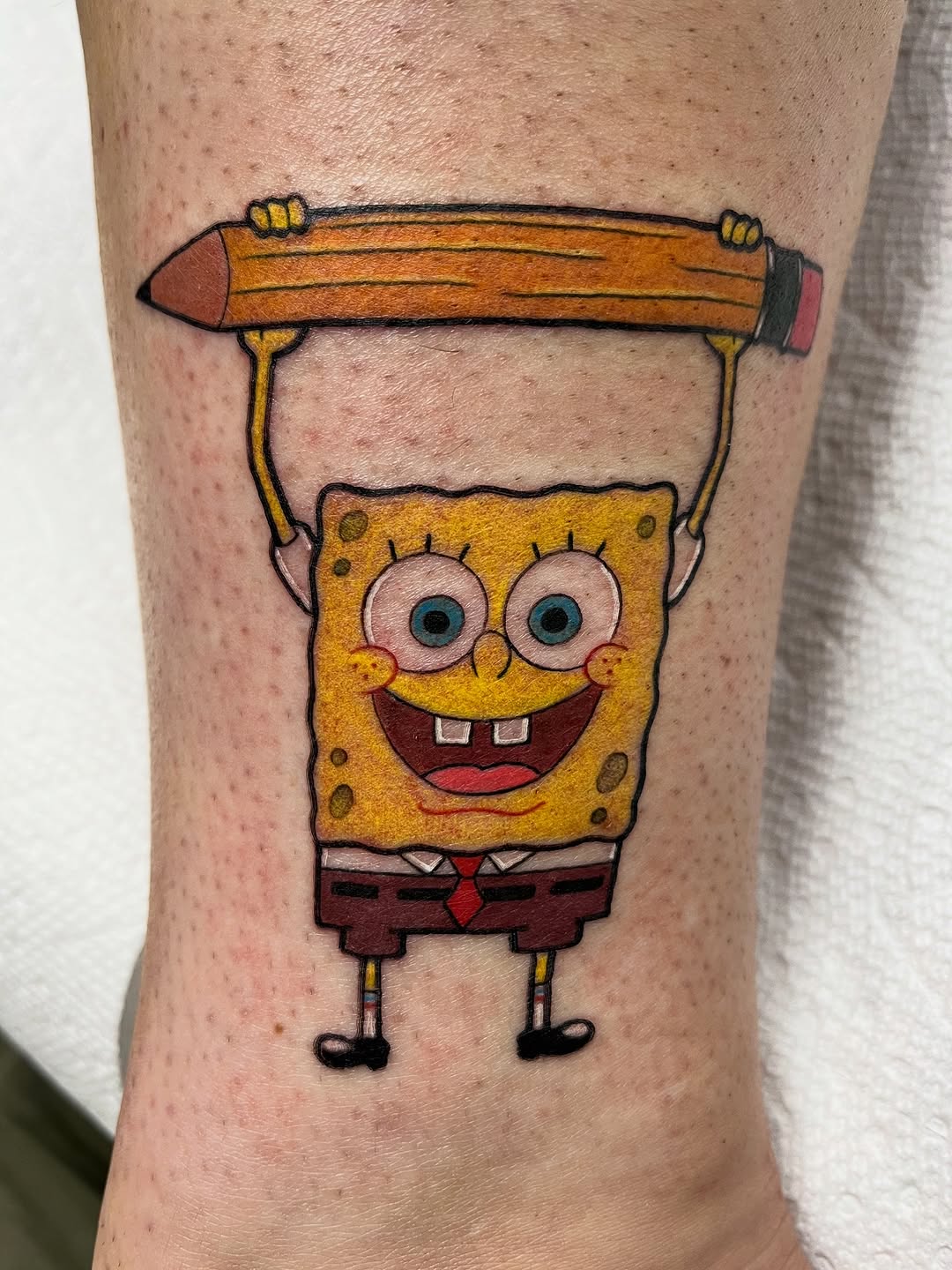 Full color SpongeBob tattoo on ankle